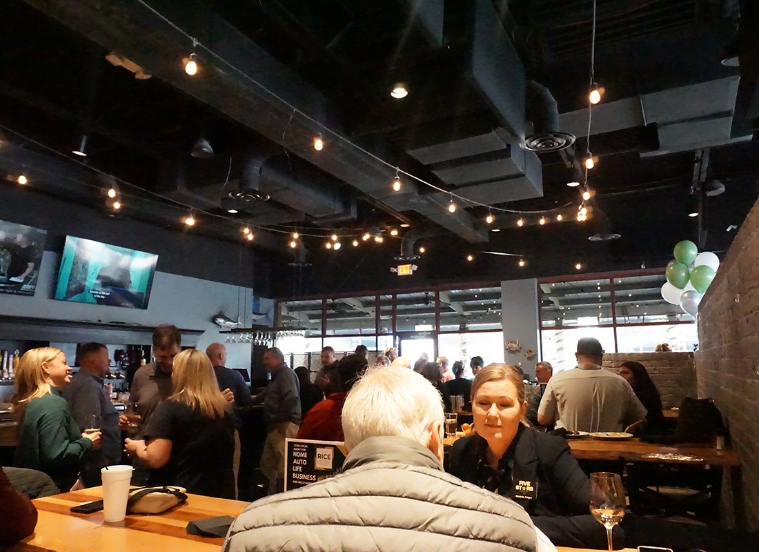 About Our Agency - Inside View of a Restaurant Full of People During a Midlothian Seafood Event with Rice Insurance