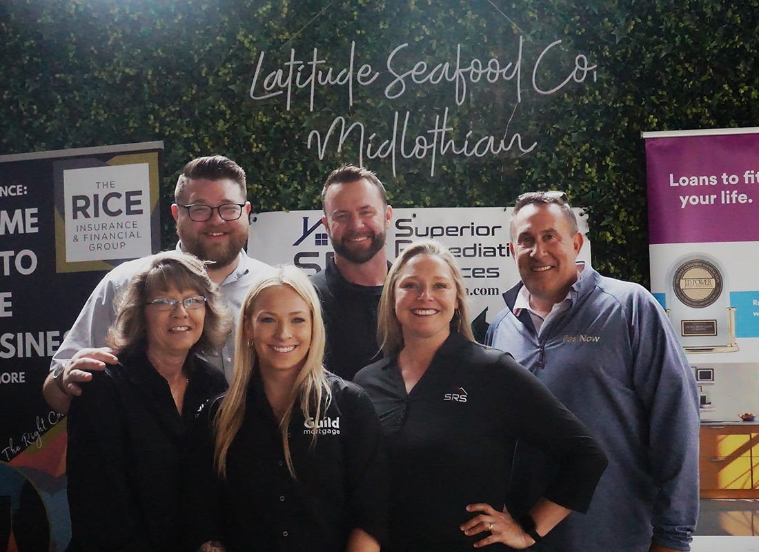 About Our Agency - Smiling Rice Insurance and Financial Group Team Members During a Midlothian Seafood Event